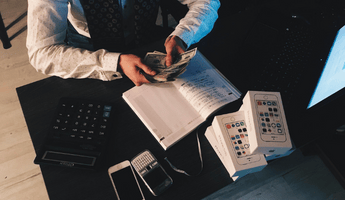 person counting money